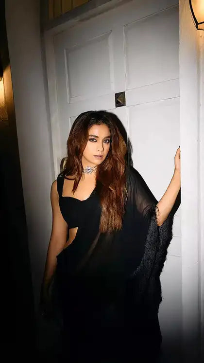 Keerthy Suresh Exudes Glamour in Daring Fringe-Adorned Black Saree