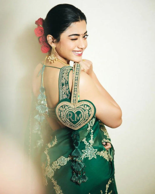 Rashmika Mandanna Radiates Grace in a Stunning Green Satin Saree
