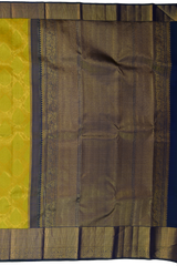 Lime Green Kanchipuram Silk Saree with embossed on the body with Peacock blue contrast border and Thick mayil kan
