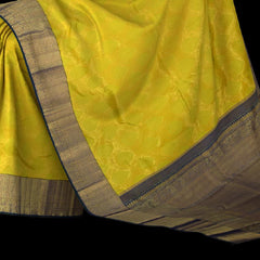 Lime Green Kanchipuram Silk Saree with embossed on the body with Peacock blue contrast border and Thick mayil kan