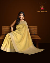Pale Yellow Kanchipuram Silk Saree with Elephant and Annapakshi Jackard on the body with Ivory contrast border and Pale Yellow Diagonal lines pallu
