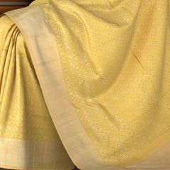 Pale Yellow Kanchipuram Silk Saree with Elephant and Annapakshi Jackard on the body with Ivory contrast border and Pale Yellow Diagonal lines pallu
