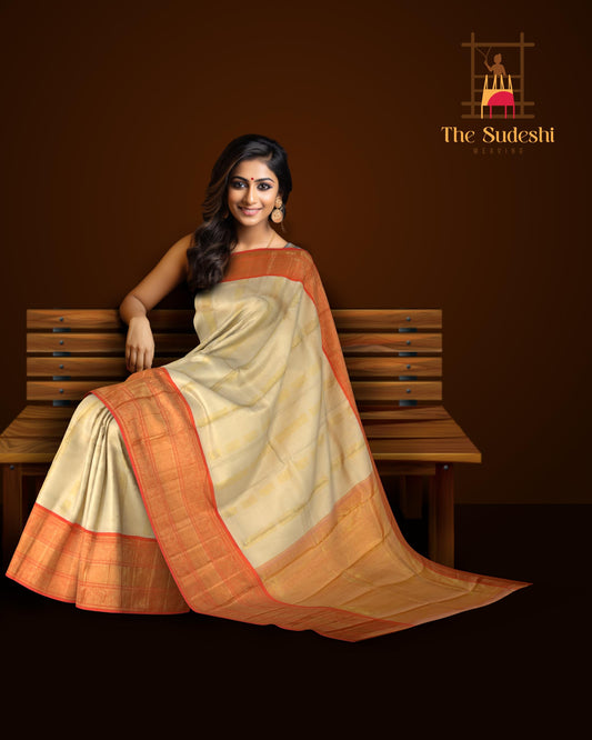 Off White Kanchipuram Silk Saree with Tissue zari on the body with Orange contrast border and Orange annam pallu