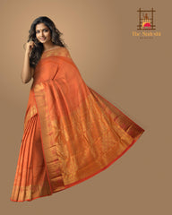 Peach Kanchipuram Silk Saree with Tear drop Jackard on the body with Peach self border and Orange Pink Square with thick butta pallu