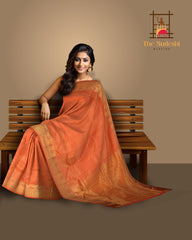 Peach Kanchipuram Silk Saree with Tear drop Jackard on the body with Peach self border and Orange Pink Square with thick butta pallu