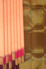 Peach Kanchipuram Silk Saree with Korvai Plain on the body with Beetroot and pink and gold checks border and Magenta Tissue pallu