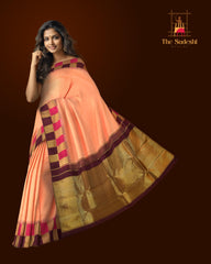 Peach Kanchipuram Silk Saree with Korvai Plain on the body with Beetroot and pink and gold checks border and Magenta Tissue pallu