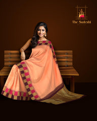 Peach Kanchipuram Silk Saree with Korvai Plain on the body with Beetroot and pink and gold checks border and Magenta Tissue pallu