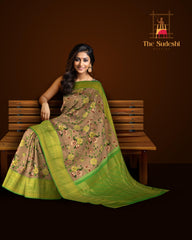 Beige with brown flowers Kanchipuram Silk Saree with Floral digital Plain on the body with Parrot Green contrast border and Parrot Green pallu with diagonal lines and floral motif pallu