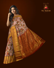 Nude Pink with Orange roses Kanchipuram Silk Saree with Floral digital Plain on the body with Rust Orange contrast border and Rust orange pallu with diagonal lines and floral motif pallu