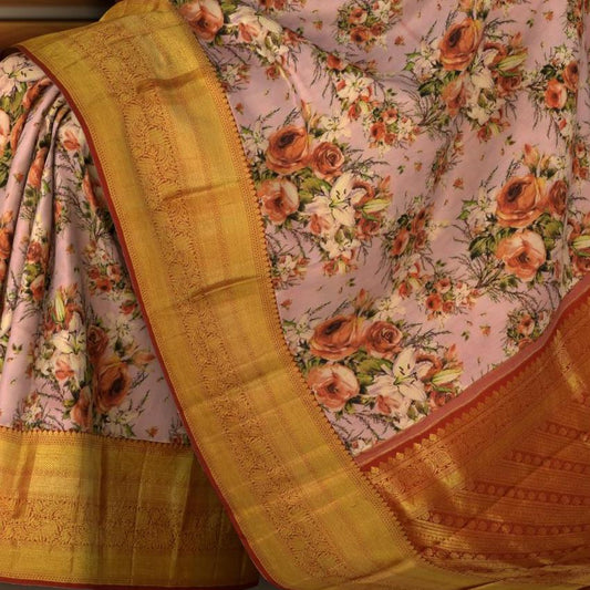 Nude Pink with Orange roses Kanchipuram Silk Saree with Floral digital Plain on the body with Rust Orange contrast border and Rust orange pallu with diagonal lines and floral motif pallu