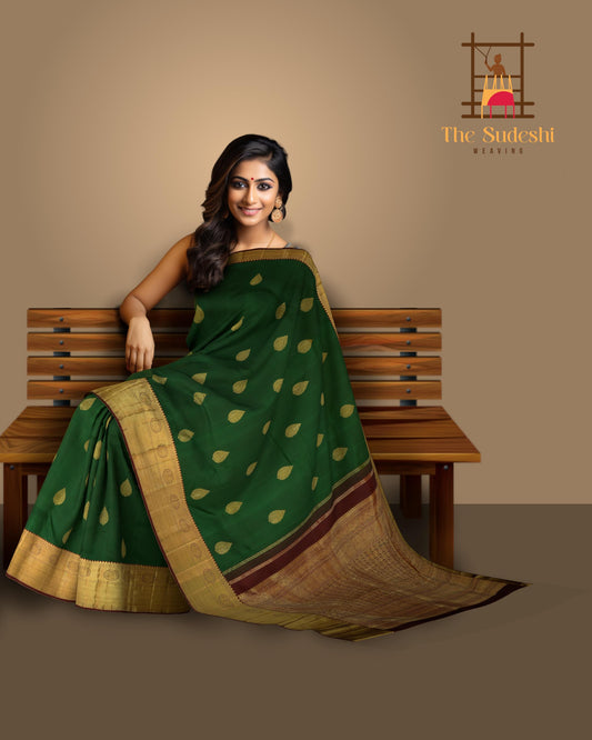 Dark Green Kanchipuram Silk Saree with Motif Leaf Plain on the body with Arakku Brown contrast border and Maroon Yaali, peacock, kamalam pallu