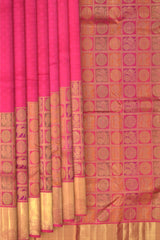 Rani Pink Kanchipuram Silk Saree with Jackard Half and half saree. Half with Mayil, Yaali checks motif. Other half is plain body with Semi circle border and Pink Rudraksham with Annapakshi Checks Pallu