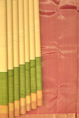 Off White Kanchipuram Silk Saree with Tissue Small tear drop body with Layered elephant, rudraksha, Annam Double Border and Pink grand mango with diamond design tissue pallu