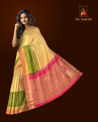 Off White Kanchipuram Silk Saree with Tissue Small tear drop body with Layered elephant, rudraksha, Annam Double Border and Pink grand mango with diamond design tissue pallu