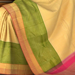 Off White Kanchipuram Silk Saree with Tissue Small tear drop body with Layered elephant, rudraksha, Annam Double Border and Pink grand mango with diamond design tissue pallu