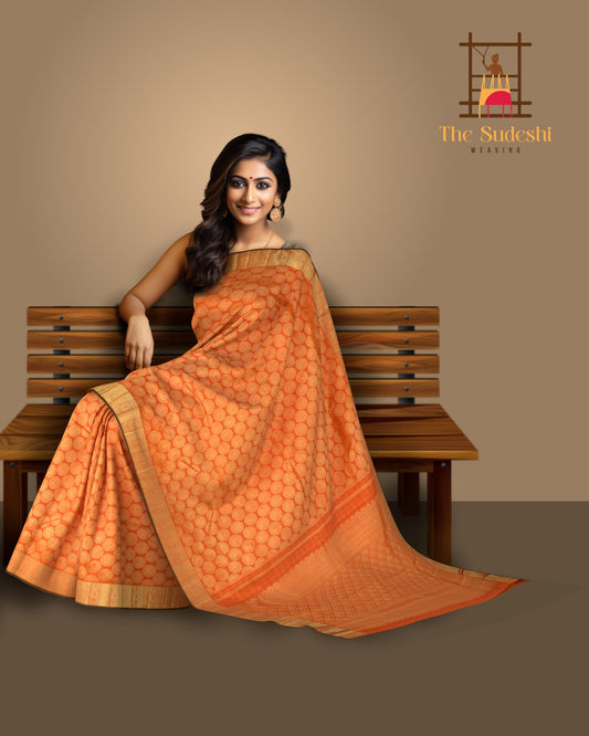Saffron Orange Kanchipuram Silk Saree with Jackard Round Annam body with Mango Self border and Saffron Orange Grand diamond design with Kamalam motif Pallu