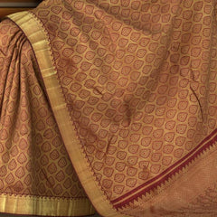 Maroon Kanchipuram Silk Saree with Jackard Jackard - Tear body with Mango Bavanchi Self border and Grand Maroon Pallu with Embossed Flower Motif with Basket Weave Pattern