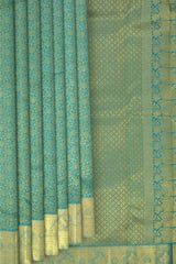 Bluish Green Kanchipuram Silk Saree with Jacquard Floral body with Mango Self border and Lotus floral Pallu