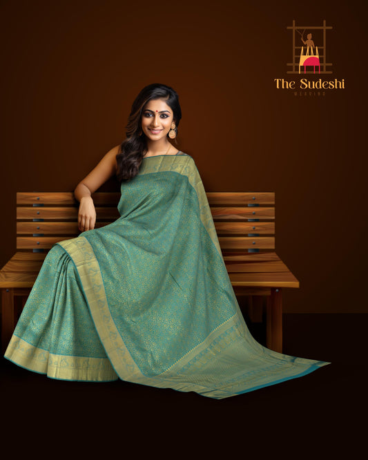 Bluish Green Kanchipuram Silk Saree with Jacquard Floral body with Mango Self border and Lotus floral Pallu