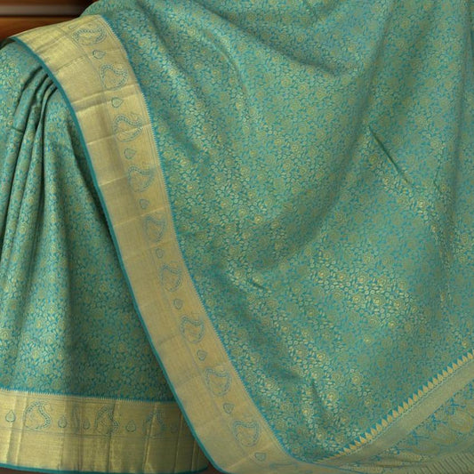 Bluish Green Kanchipuram Silk Saree with Jacquard Floral body with Mango Self border and Lotus floral Pallu