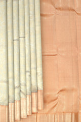 Grey Kanchipuram Silk Saree with Tissue Floral motif body with Diagnol stripes Contrast border and Orange Pallu with diagnol silver zari lines