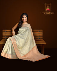 Grey Kanchipuram Silk Saree with Tissue Floral motif body with Diagnol stripes Contrast border and Orange Pallu with diagnol silver zari lines