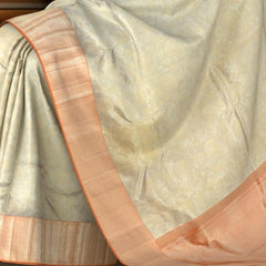 Grey Kanchipuram Silk Saree with Tissue Floral motif body with Diagnol stripes Contrast border and Orange Pallu with diagnol silver zari lines