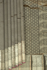 Black Kanchipuram Silk Saree with Jackard Checks body with Floral Self border with Purple Edging and Black Pallu with Mango Motif with diamond Butta