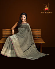 Black Kanchipuram Silk Saree with Jackard Checks body with Floral Self border with Purple Edging and Black Pallu with Mango Motif with diamond Butta