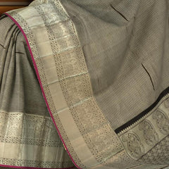 Black Kanchipuram Silk Saree with Jackard Checks body with Floral Self border with Purple Edging and Black Pallu with Mango Motif with diamond Butta