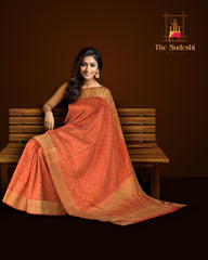 Coral Pink Kanchipuram Silk Saree with Jackard body with Lotus and bavanshi Self border and Tissue with floral embossed design Pallu
