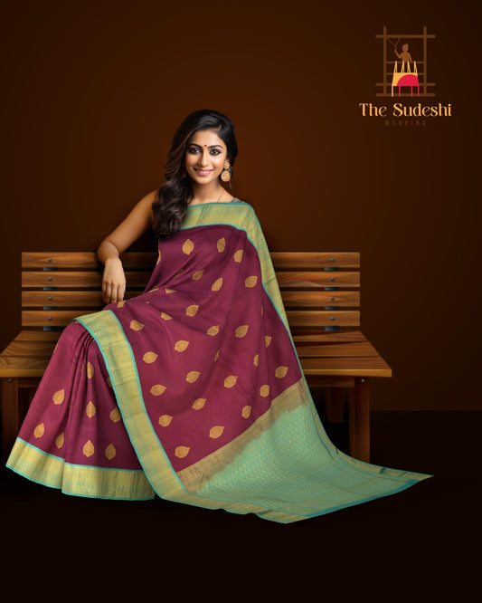 Purple Kanchipuram Silk Saree with Blue contrast border and Blue Pallu with tear shaped motif and annam