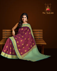 Purple Kanchipuram Silk Saree with Blue contrast border and Blue Pallu with tear shaped motif and annam