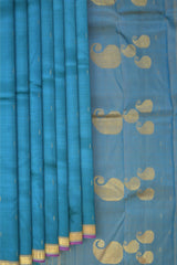 Blue Kanchipuram Silk Saree with Purple contrast border and Dull Blue Pallu with Mango Motif