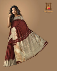 Maroon Kanchipuram Silk Saree with temple border on the body with Maroon self border and Maroon Grand Tissue Pallu