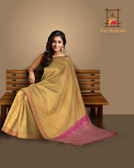 Beige Kanchipuram Silk Saree with Woven on the body with Pink contrast border and Pink Pallu with floral Motif with leaf pattern running across. Intricately designed. Grand