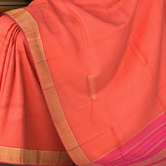 Orange and Pink Kanchipuram Silk Saree with Podi Kattam on the body with Pink contrast border and Pink pallu with mayil kan border with seer mundhi