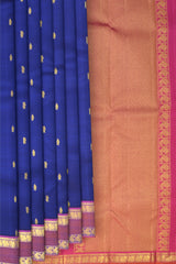 Blue Kanchipuram Silk Saree with Kalakshetra Thread Woven threadwork on the body with Annapakshi Woven contrast border and Pink Color Pallu with Annapakshi, Mango, and Zig Zag design.