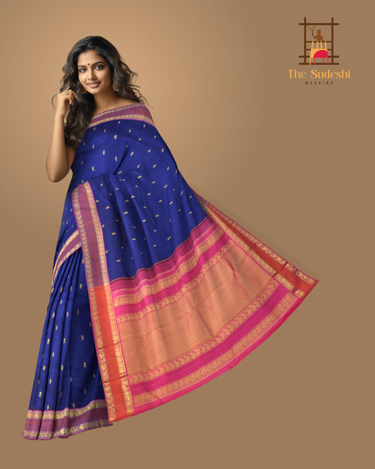 Blue Kanchipuram Silk Saree with Kalakshetra Thread Woven threadwork on the body with Annapakshi Woven contrast border and Pink Color Pallu with Annapakshi, Mango, and Zig Zag design.