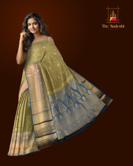 Verdant Splendor: Olive Green Pure Silk Saree with Blue Bavanshi Borders