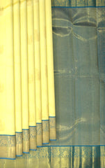 Pale Yellow Kancheevaram Silk Saree with Blue Contrast and Elephant Peacock Bavanshi