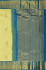 Pale Yellow Kancheevaram Silk Saree with Blue Contrast and Elephant Peacock Bavanshi