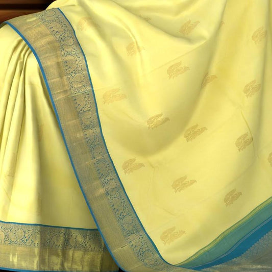 Pale Yellow Kancheevaram Silk Saree with Blue Contrast and Elephant Peacock Bavanshi