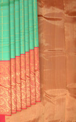 Coral Pink Confluence Pure Kanchipuram Silk Saree with Blue Floral Buttas
