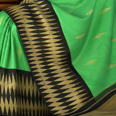 Green Plain Pure Kanchipuram Silk Saree with Diamond Butta and Black Border