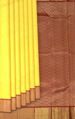 The Golden Hour Glow in Yellow Kancheevaram Silk Saree with Maroon Contrast