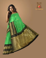 Green Plain Pure Kanchipuram Silk Saree with Diamond Butta and Black Border