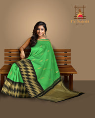 Green Plain Pure Kanchipuram Silk Saree with Diamond Butta and Black Border