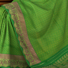 Verdant Mystique: Green Pure Silk Saree with Pink Lotus Borders